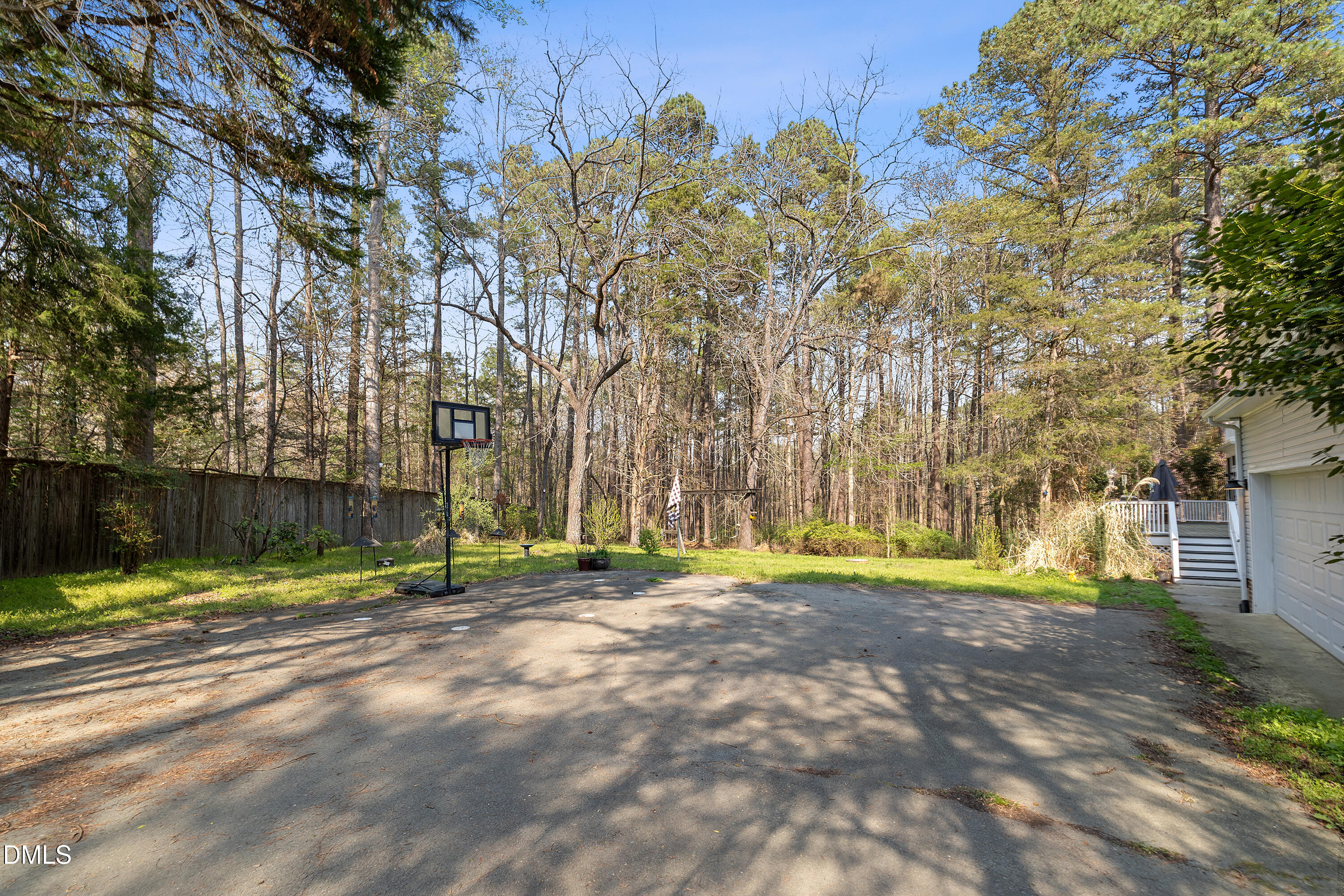 340 Andrews Store Road Pittsboro, NC 27312 - Photo 53 of 59 a view of a basketball area with large trees