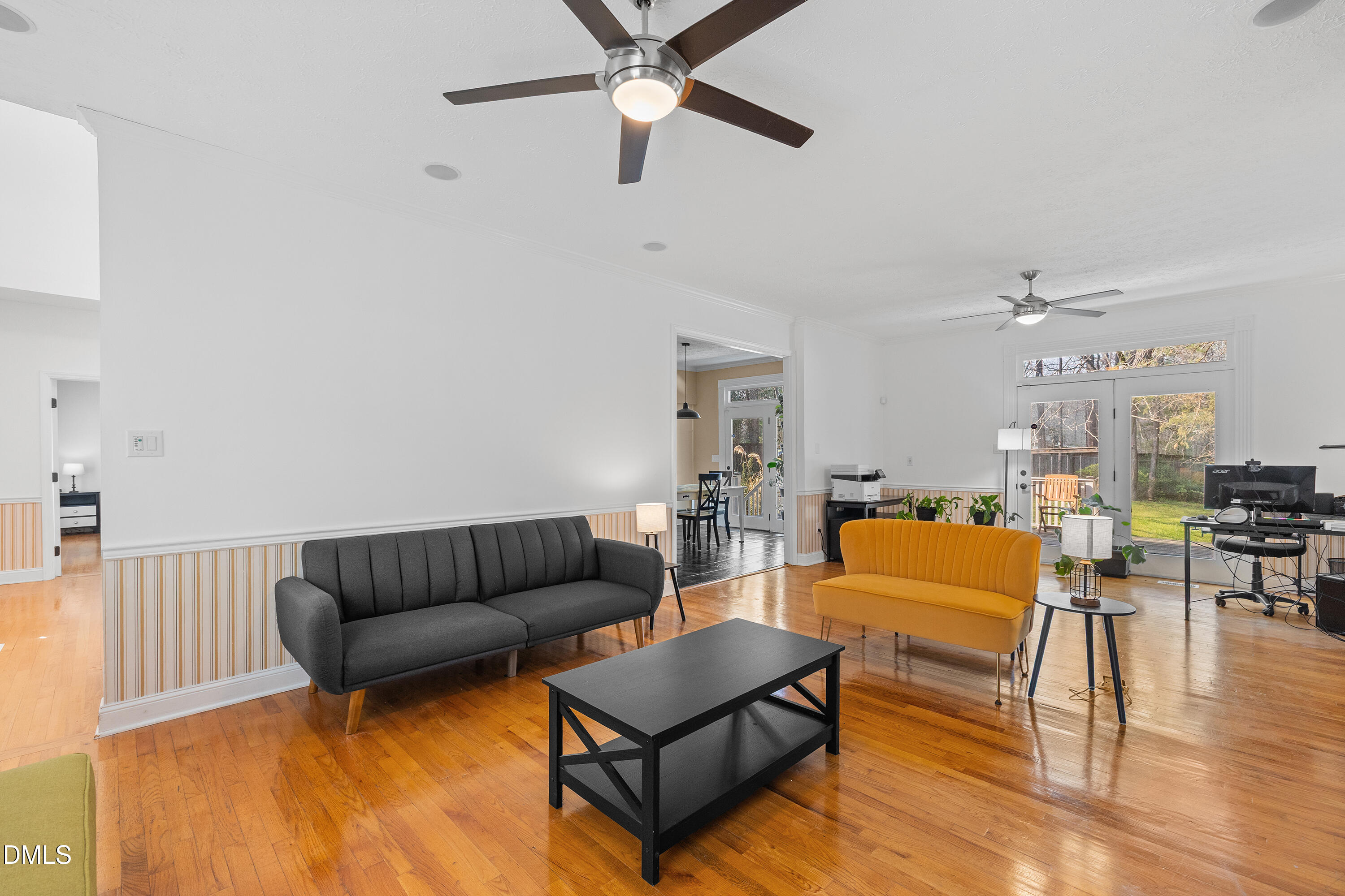 340 Andrews Store Road Pittsboro, NC 27312 - Photo 9 of 59 a living room with furniture and a wooden floor