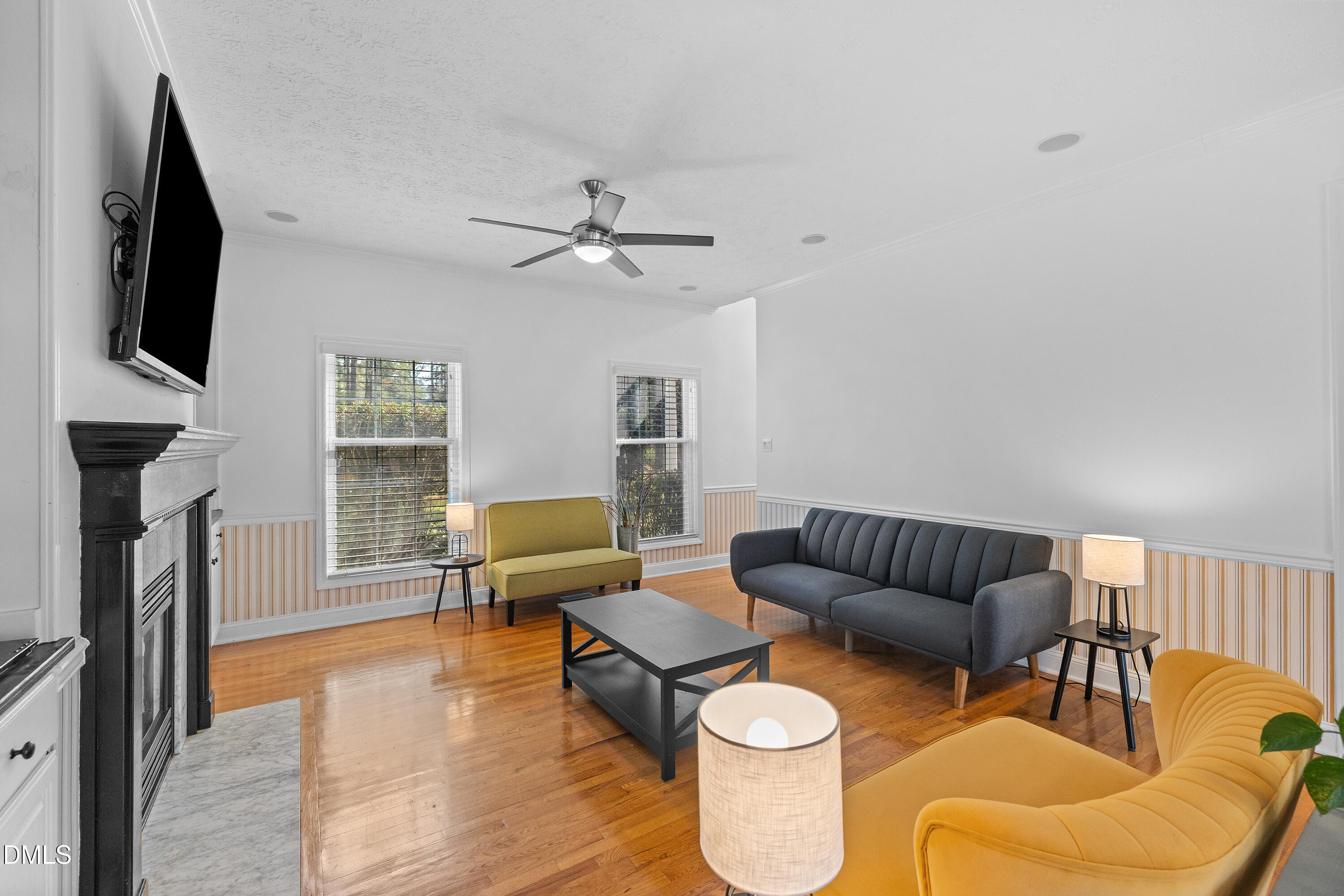 340 Andrews Store Road Pittsboro, NC 27312 - Photo 10 of 59 a living room with furniture fireplace and flat screen tv