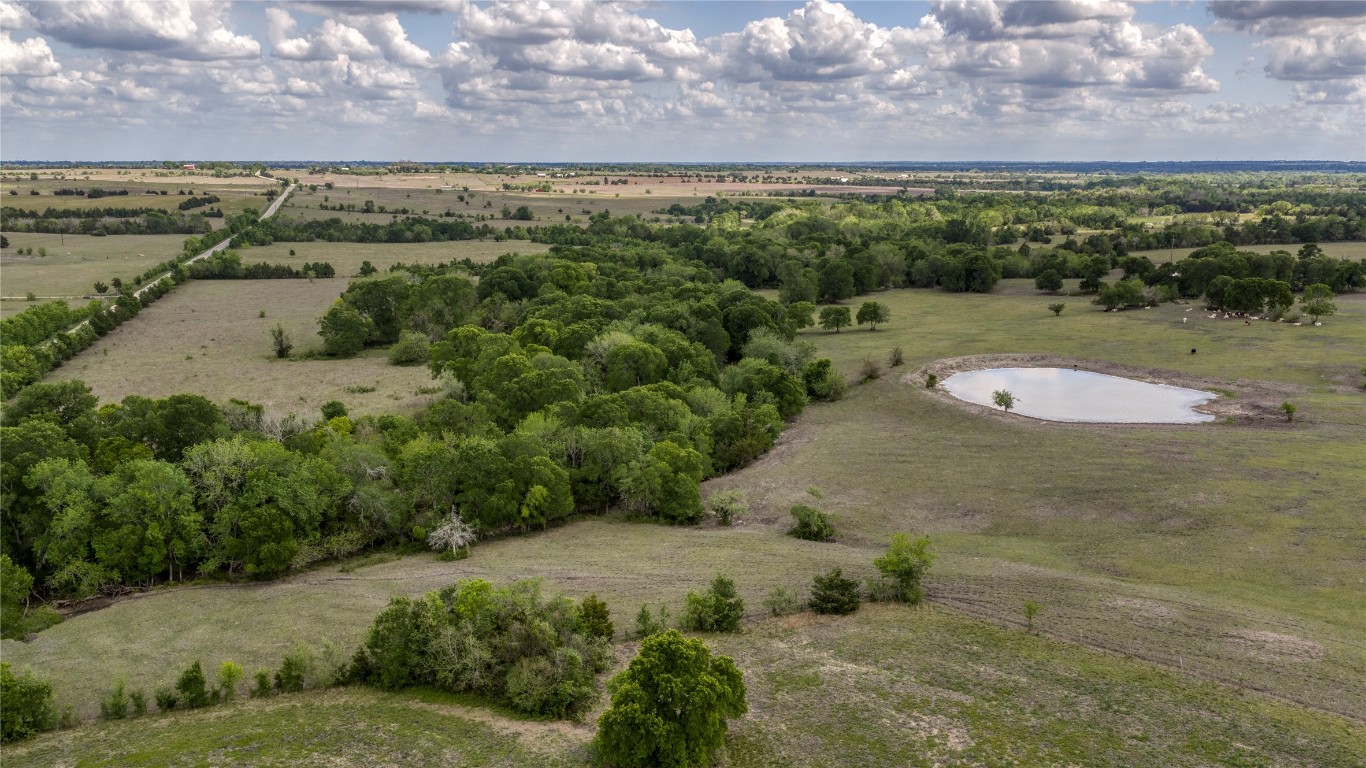 6807 Winedale Road Burton, TX 77835 - Photo 20 of 24 a view of a lake with a mountain