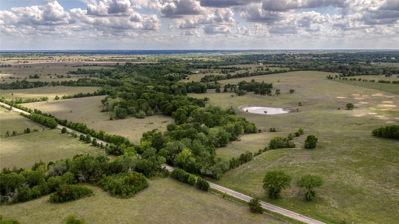 6807 Winedale Road Burton, TX 77835 - Photo 7 of 24 a view of a lake with a city