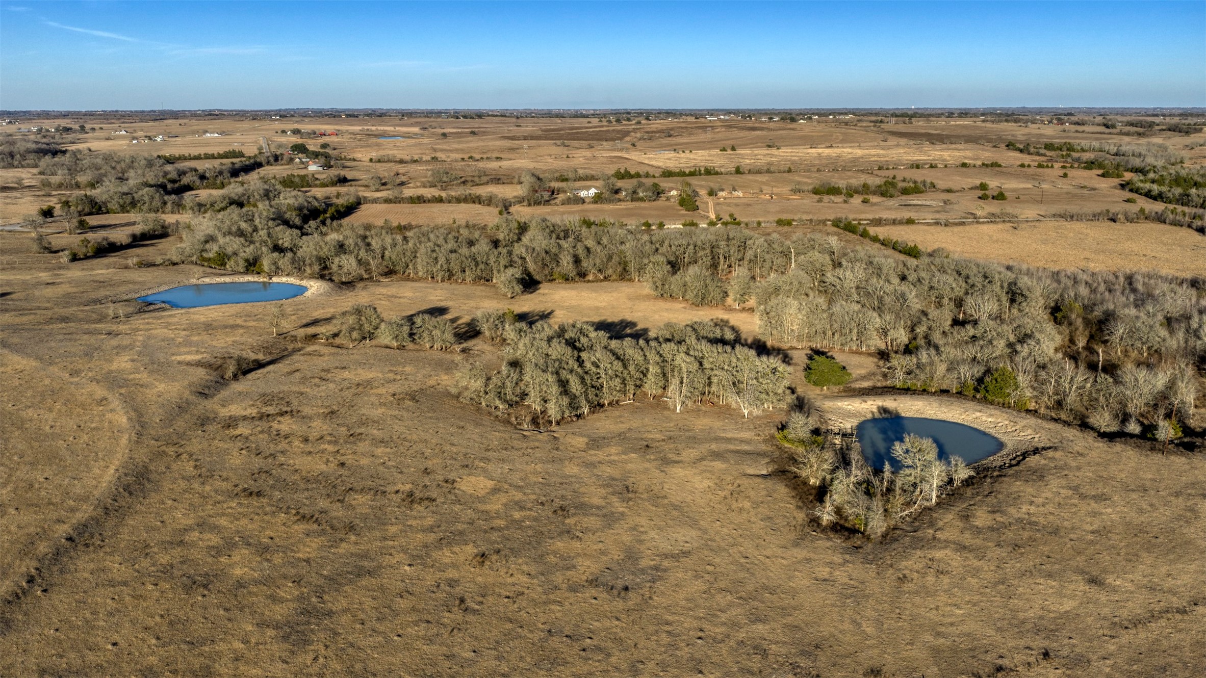 6807 Winedale Road Burton, TX 77835 - Photo 9 of 27 an aerial view of residential houses with outdoor space