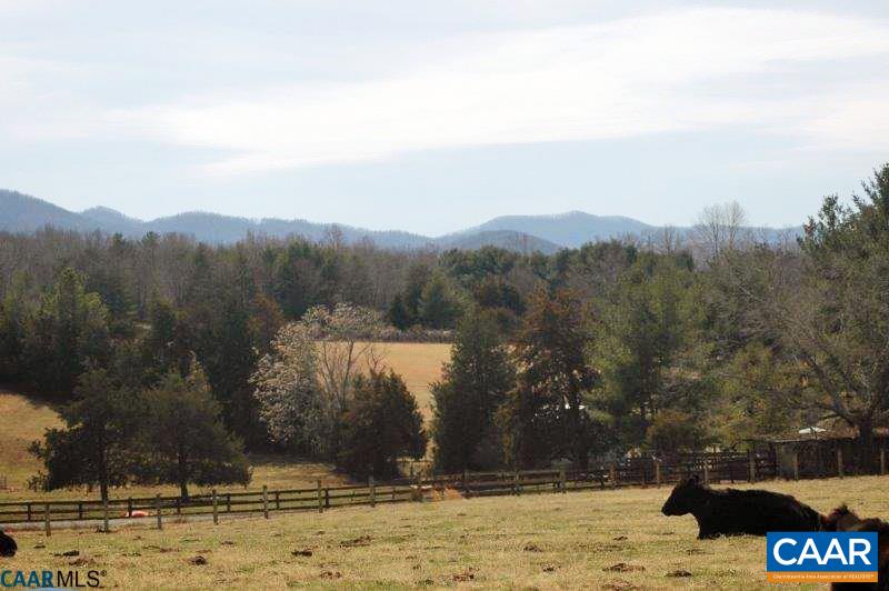a view of a water with mountain