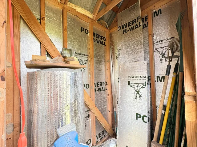 a view of a balcony with wooden floor and stairs