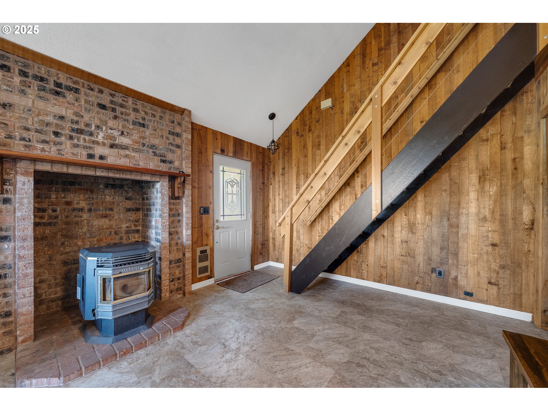 4900 Clam Way Tillamook, OR 97141 - Photo 13 of 30 a view of an entryway with floor to ceiling windows