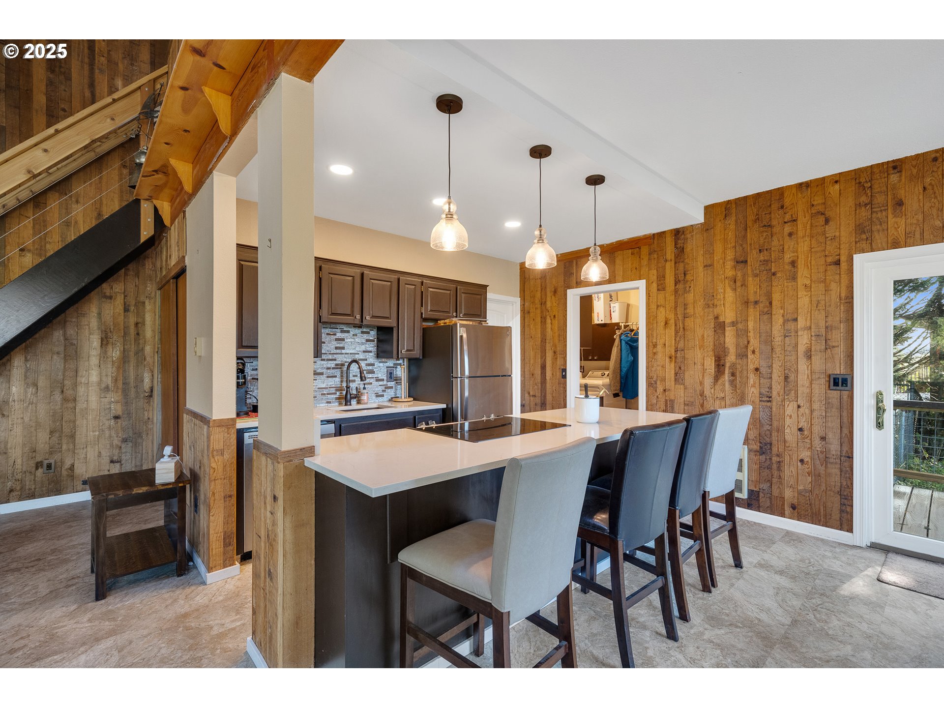 4900 Clam Way Tillamook, OR 97141 - Photo 18 of 30 a view of a dining room with furniture