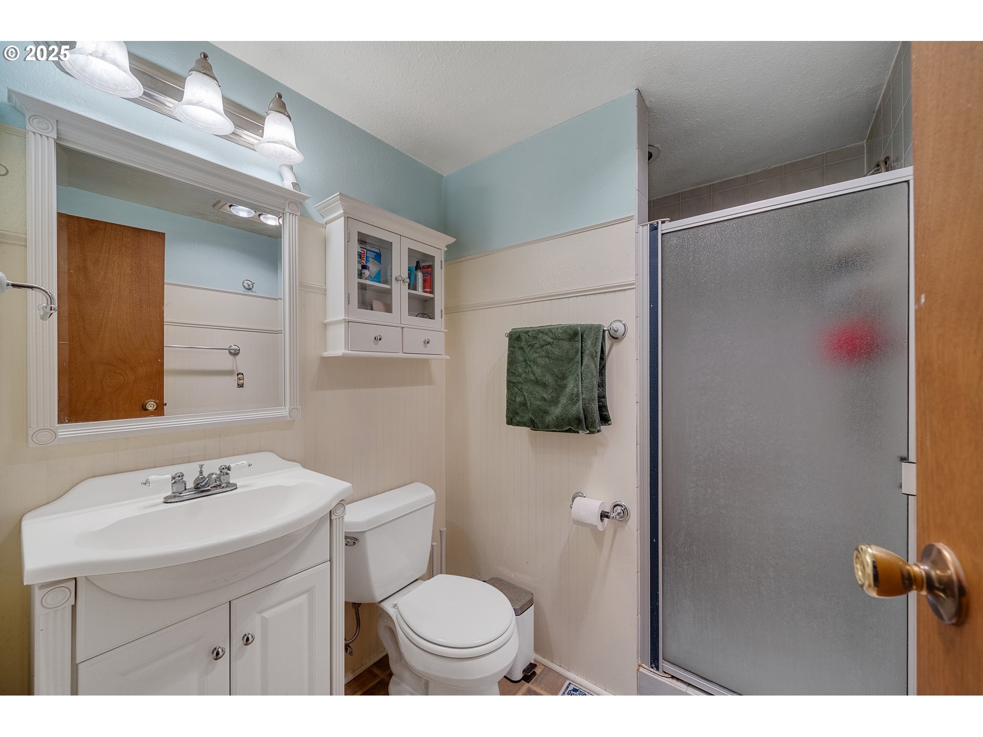 4900 Clam Way Tillamook, OR 97141 - Photo 20 of 30 a bathroom with a sink toilet and shower