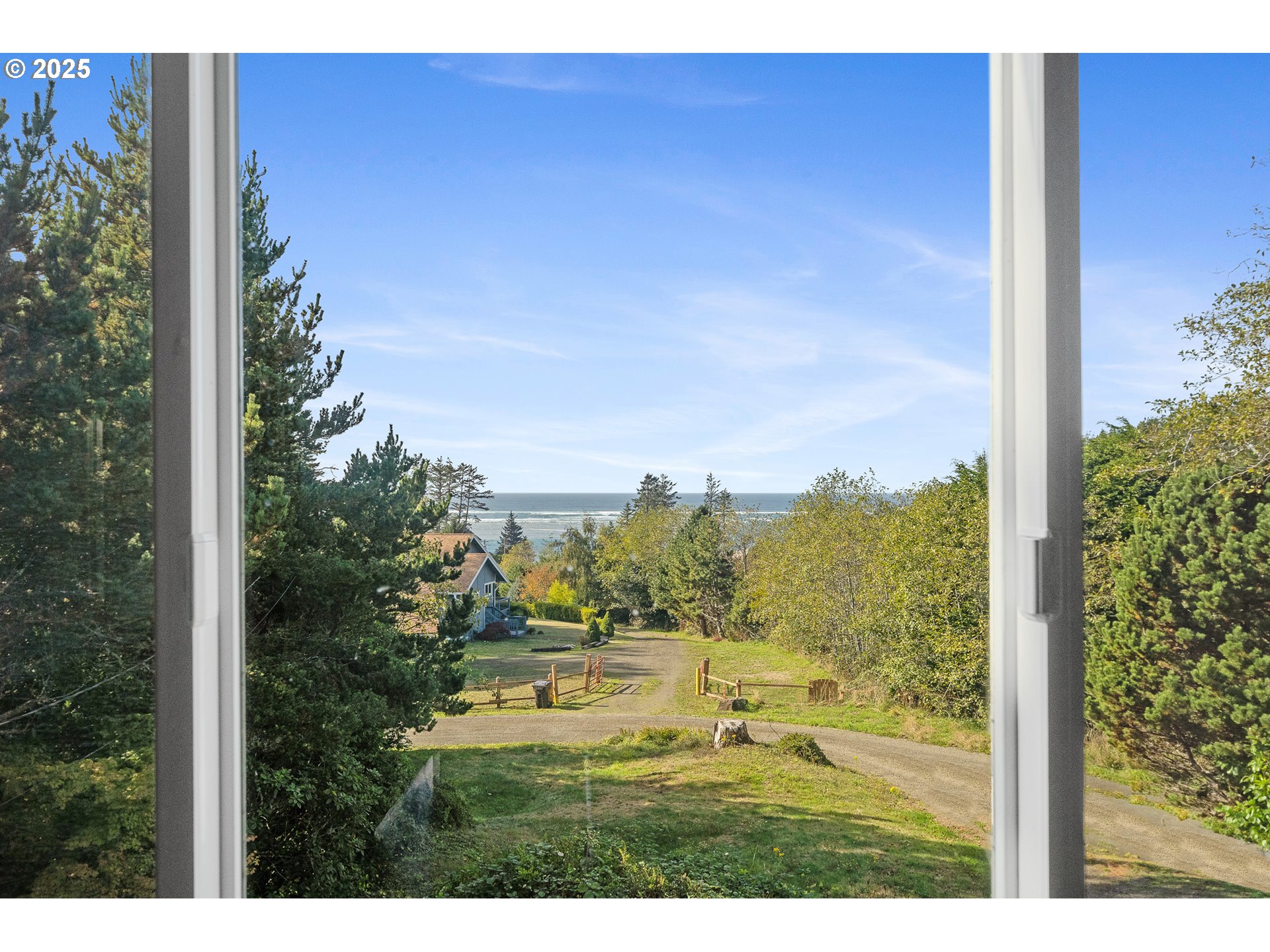 4900 Clam Way Tillamook, OR 97141 - Photo 23 of 30 a view of an outdoor space and a yard