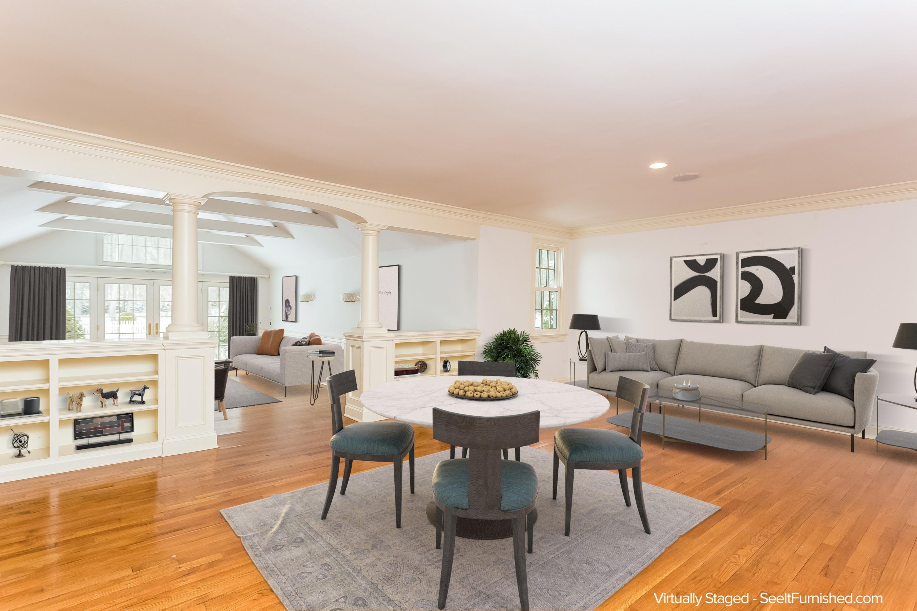 183 Turtle Back Road New Canaan, CT 06840 - Photo 18 of 53 a living room with furniture and a wooden floor