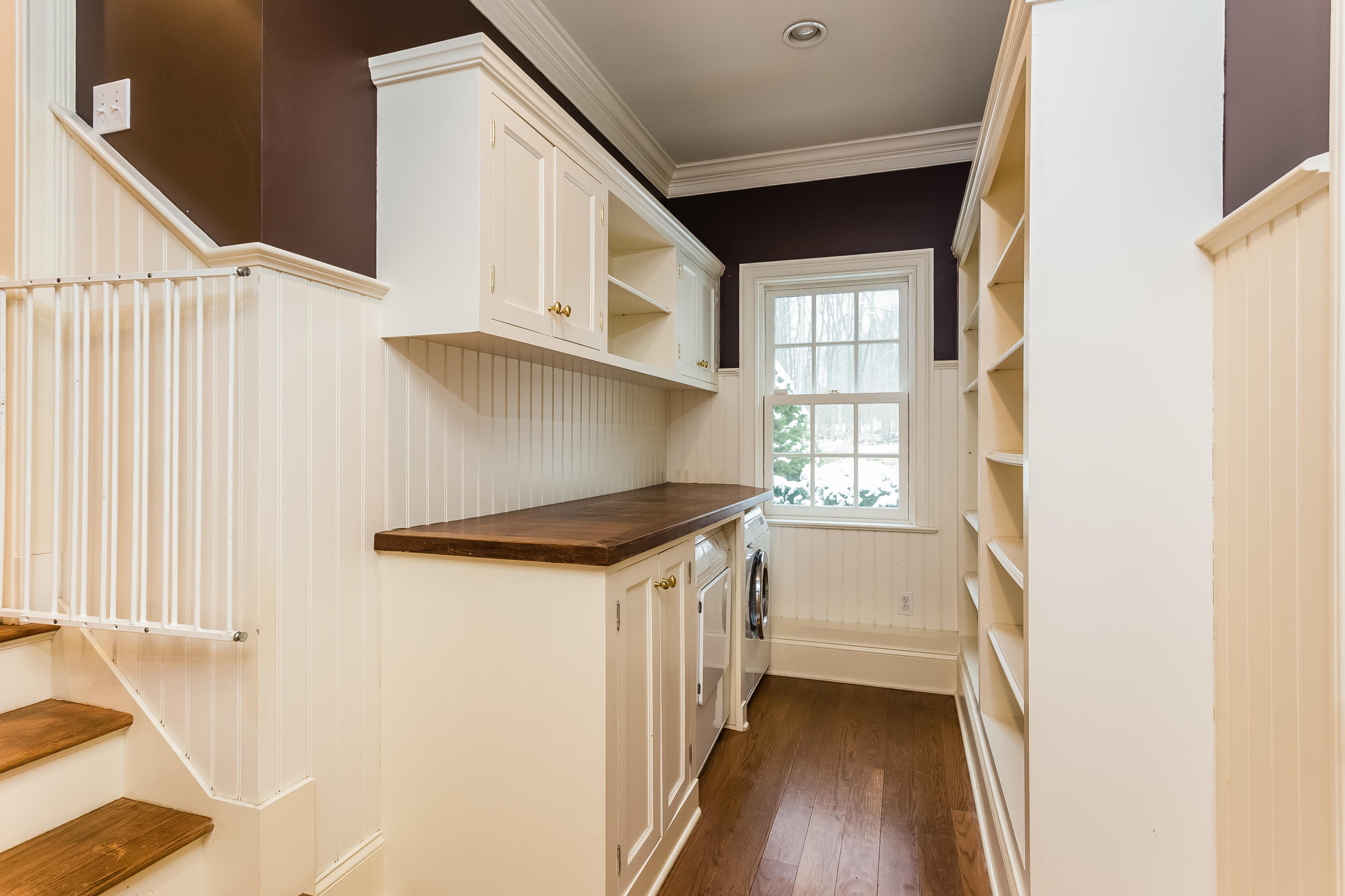 183 Turtle Back Road New Canaan, CT 06840 - Photo 19 of 53 a kitchen with a stove a sink and a refrigerator