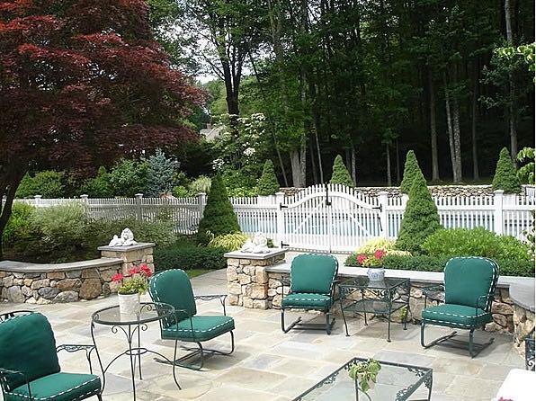 183 Turtle Back Road New Canaan, CT 06840 - Photo 3 of 53 a patio with sofas table and chairs