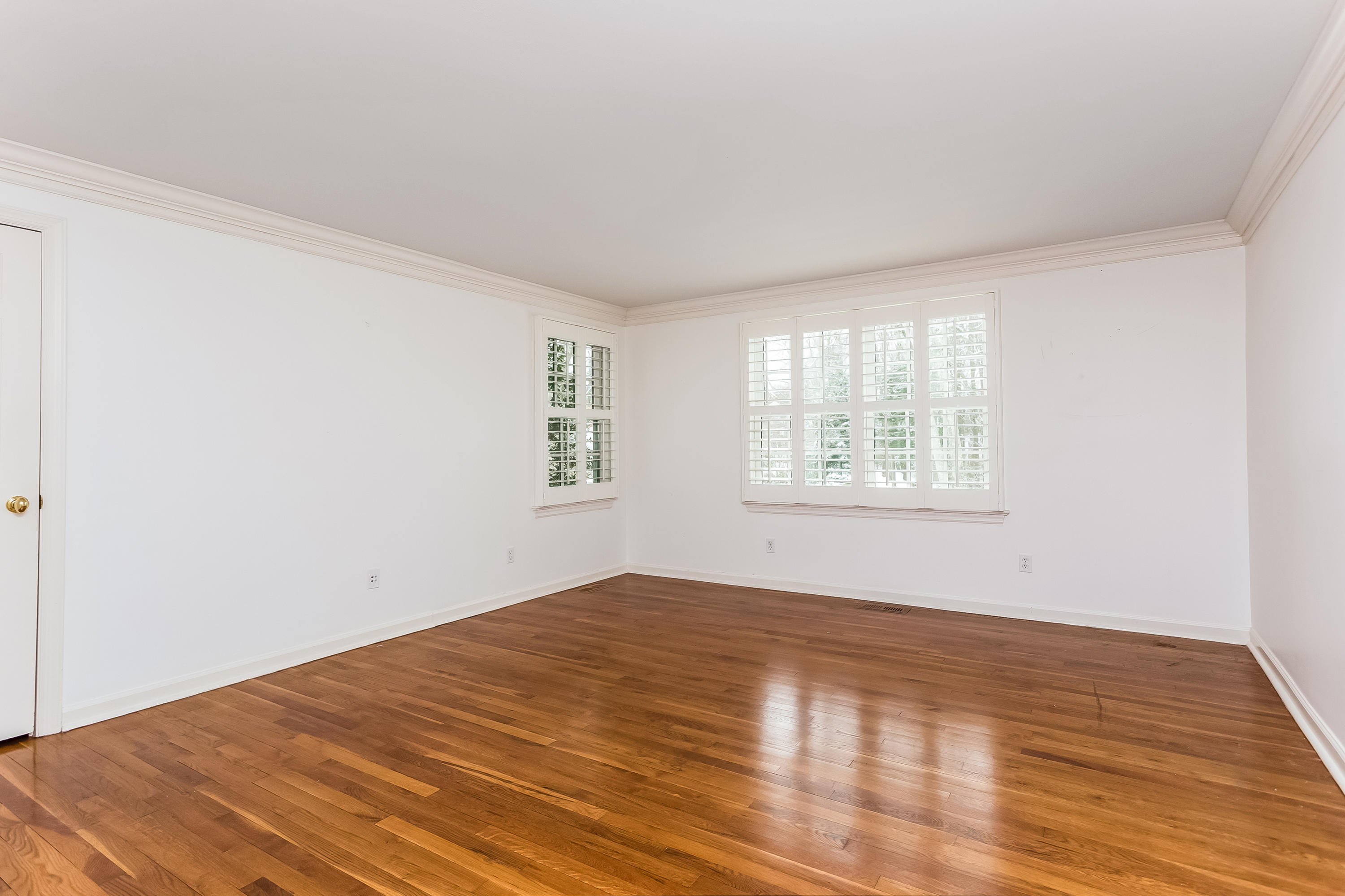 183 Turtle Back Road New Canaan, CT 06840 - Photo 25 of 53 a view of empty room with wooden floor and fan