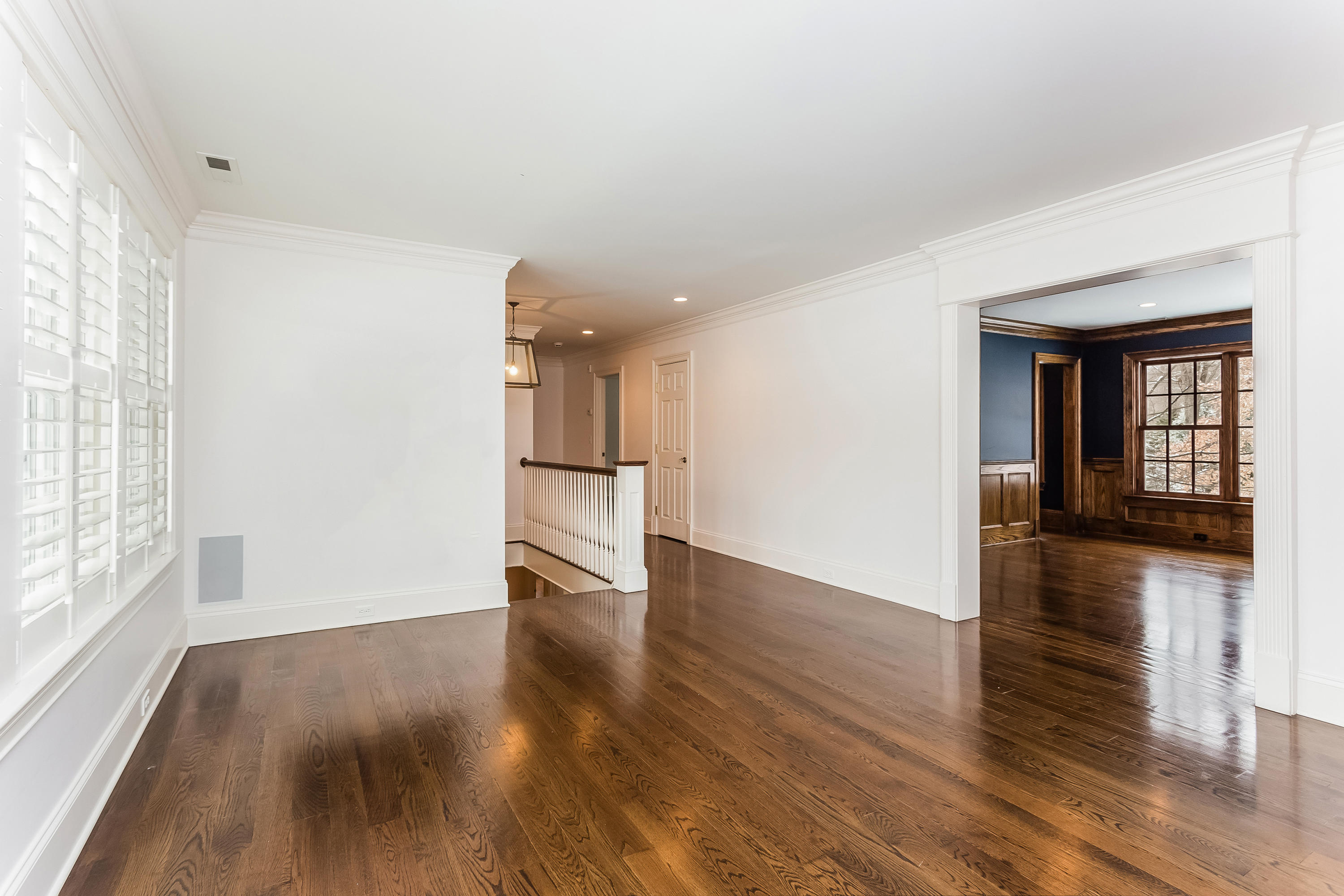 183 Turtle Back Road New Canaan, CT 06840 - Photo 29 of 53 a view of empty room with wooden floor and fan