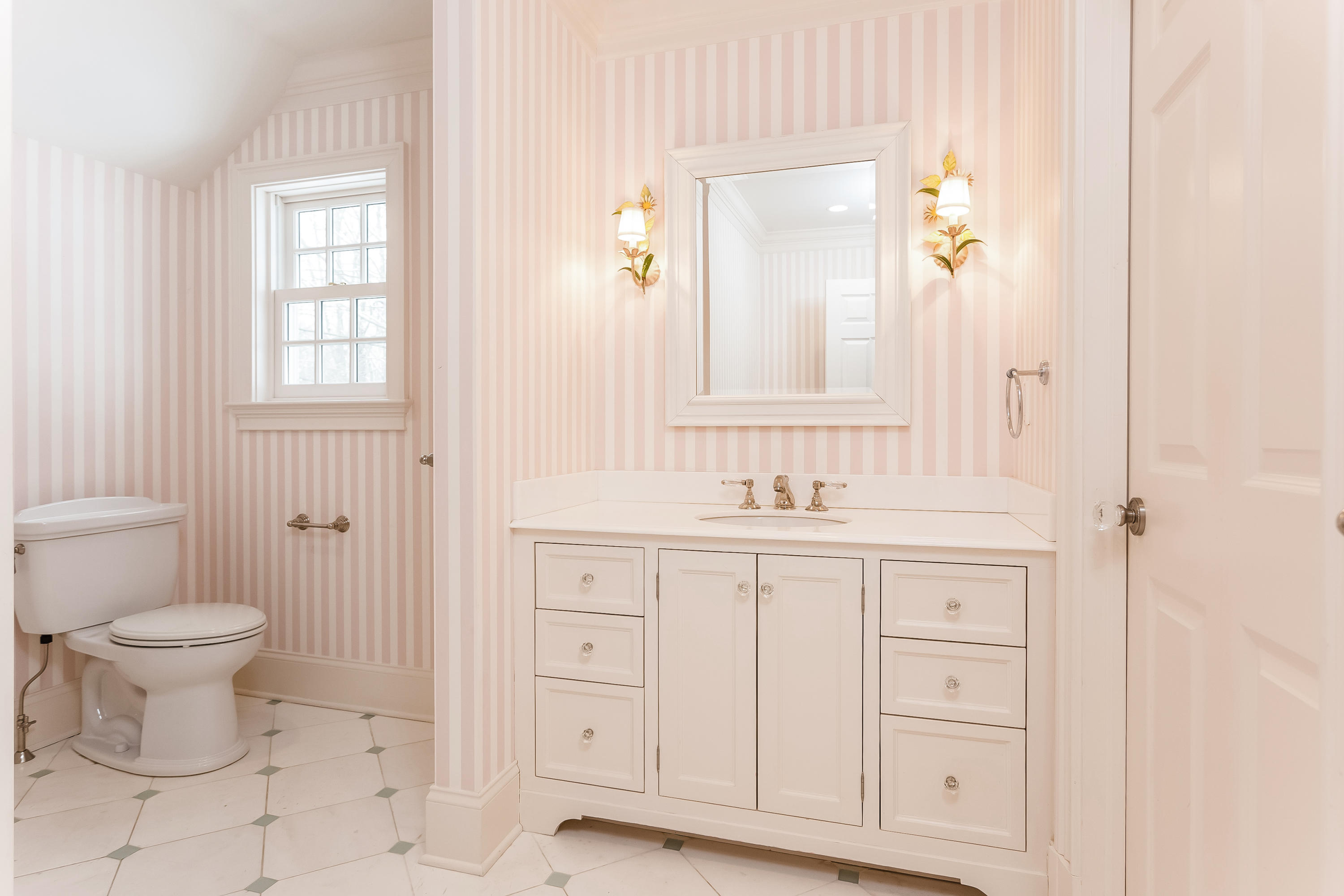 183 Turtle Back Road New Canaan, CT 06840 - Photo 42 of 53 a bathroom with a toilet sink and mirror