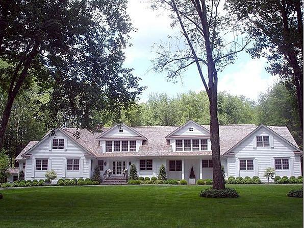 183 Turtle Back Road New Canaan, CT 06840 - Photo 50 of 53 a front view of a house with a garden