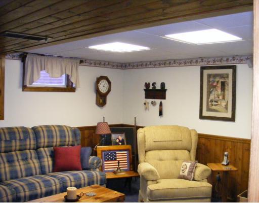 395 Lagonda Road Washington, PA 15301 - Photo 12 of 18 Den/Family/Great Room. Family room in the basement has a wood burning stove.