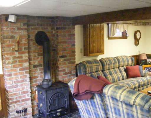 395 Lagonda Road Washington, PA 15301 - Photo 13 of 18 Other. Wood burning stove in the family room basement.