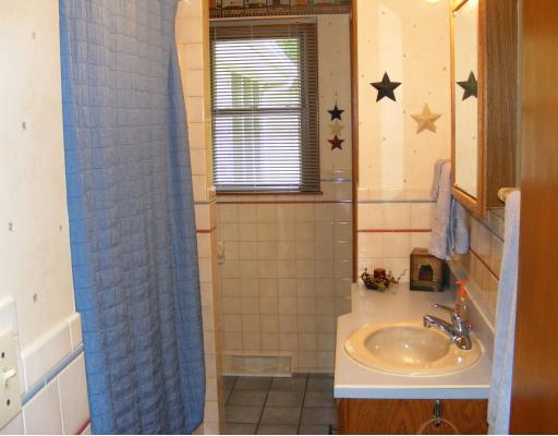 395 Lagonda Road Washington, PA 15301 - Photo 15 of 18 Other. Ceramic tile in the main bath, neutral tub and surround. Neat and clean.