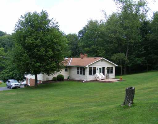 395 Lagonda Road Washington, PA 15301 - Photo 4 of 18 Exterior Back. From the back yard you see the sunroom addition. Lots of space for play or garden area.