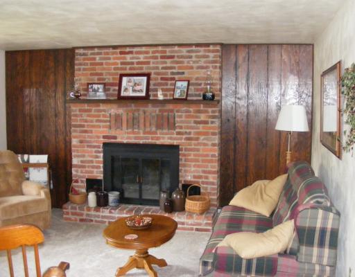 395 Lagonda Road Washington, PA 15301 - Photo 7 of 18 Living Room. Neutral carpet in the living room. Brick fireplace is wood burning in the living room. Cozy comfort!