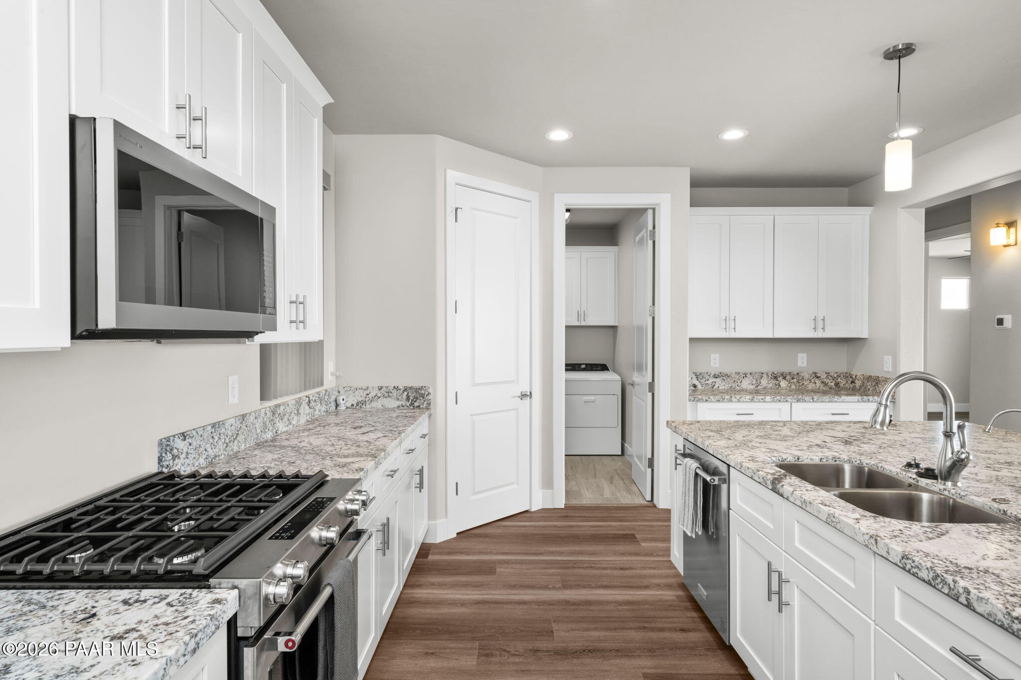 15689 East Orch Vw Road Dewey, AZ 86327 - Photo 11 of 39 a kitchen with stainless steel appliances granite countertop a stove and a sink