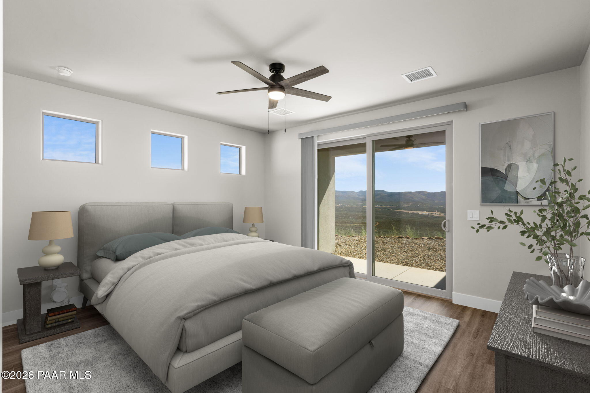 15689 East Orch Vw Road Dewey, AZ 86327 - Photo 14 of 39 a bedroom with a large bed and a couch
