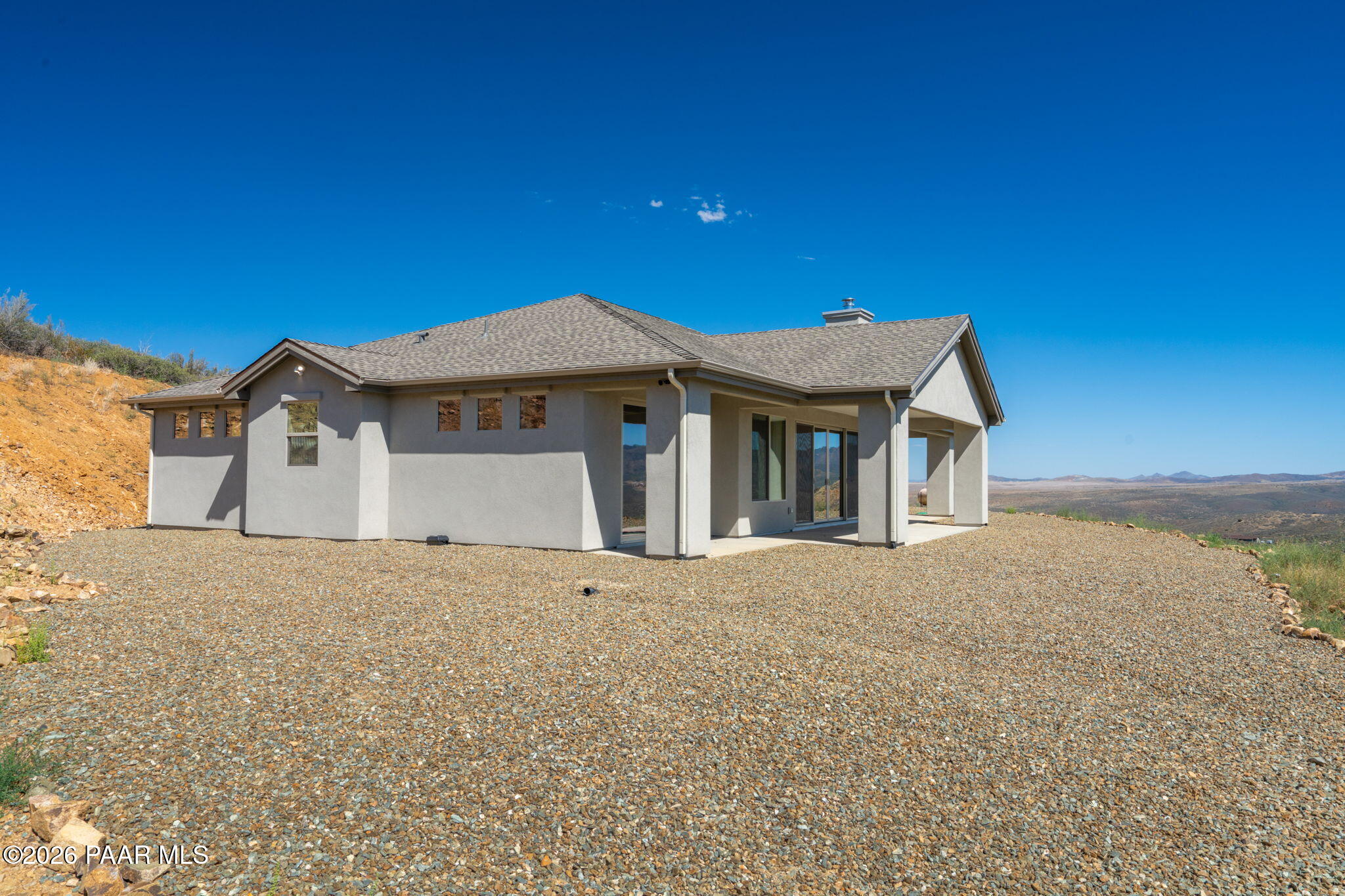 15689 East Orch Vw Road Dewey, AZ 86327 - Photo 33 of 39 a front view of a house with a garden