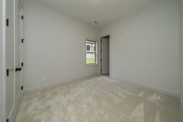 a view of an empty room with window