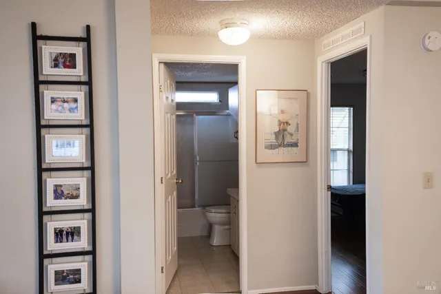 a bathroom with a toilet and a sink