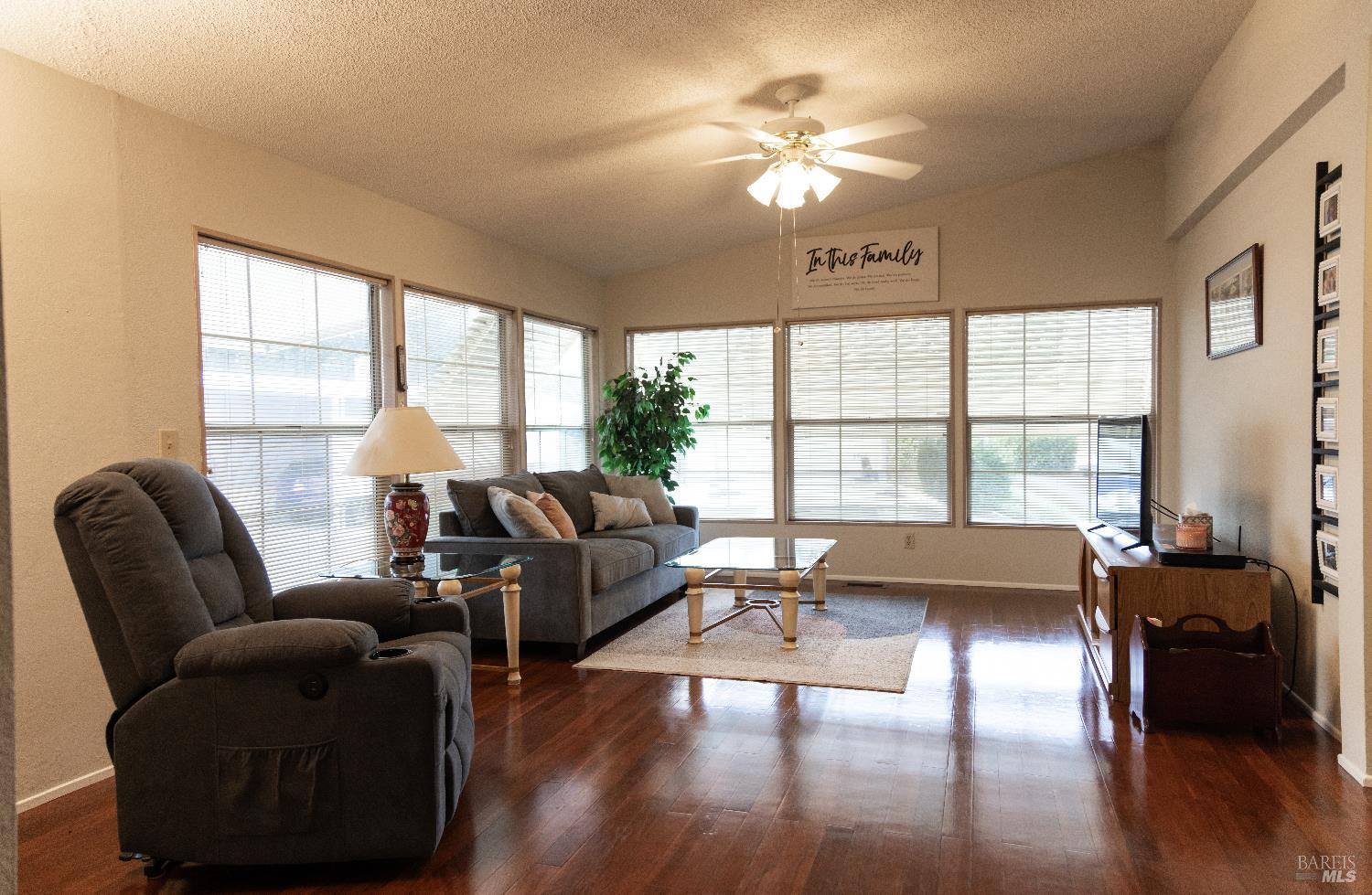 171 Colonial Park Drive Santa Rosa, CA 95403 - Photo 6 of 29 a living room with furniture and a large window