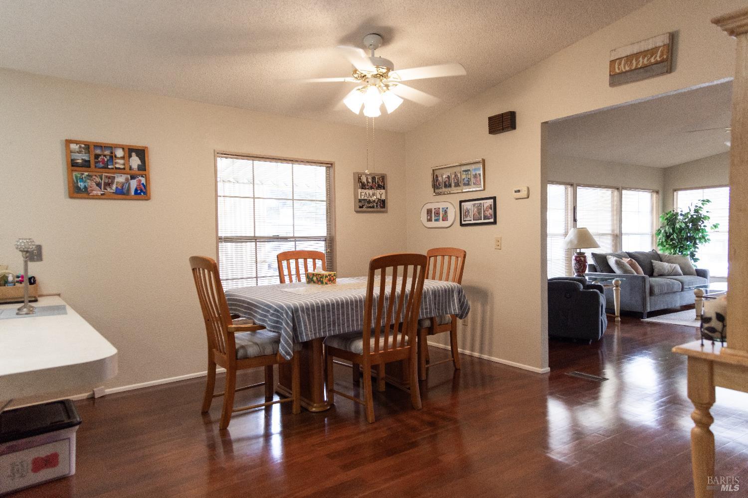 171 Colonial Park Drive Santa Rosa, CA 95403 - Photo 8 of 29 a view of a a dining room with furniture window and wooden floor