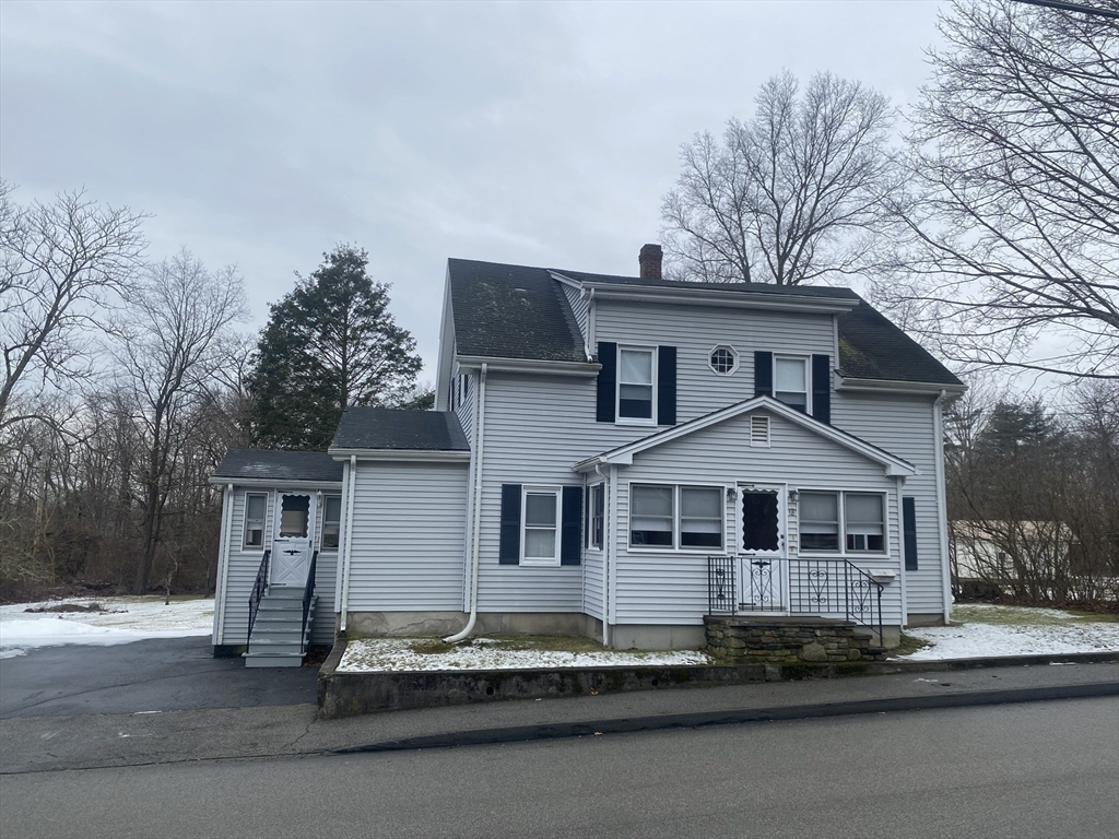 18 Eastern Avenue Webster, MA 01570 - Photo 2 of 36 a front view of a house with a yard