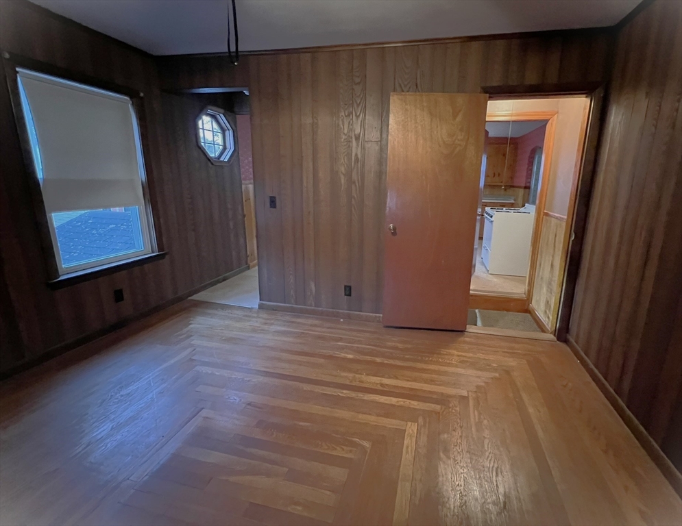 18 Eastern Avenue Webster, MA 01570 - Photo 25 of 36 a view of a hallway with wooden floor