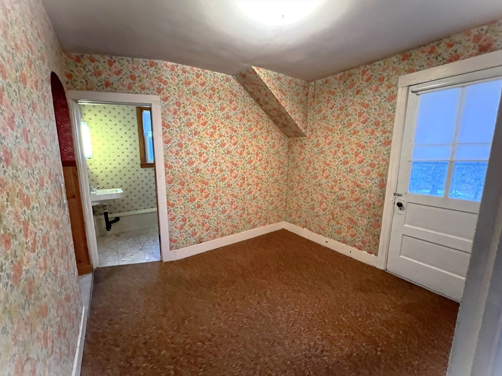 18 Eastern Avenue Webster, MA 01570 - Photo 27 of 36 wooden floor in a hall with an entryway