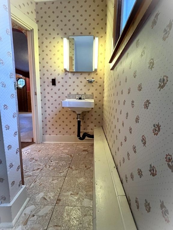 18 Eastern Avenue Webster, MA 01570 - Photo 28 of 36 a bathroom with a sink toilet and shower