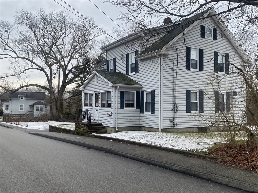 18 Eastern Avenue Webster, MA 01570 - Photo 3 of 36 a front view of a house with a yard