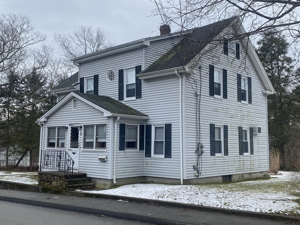 18 Eastern Avenue Webster, MA 01570 - Photo 4 of 36 a front view of a house with garage
