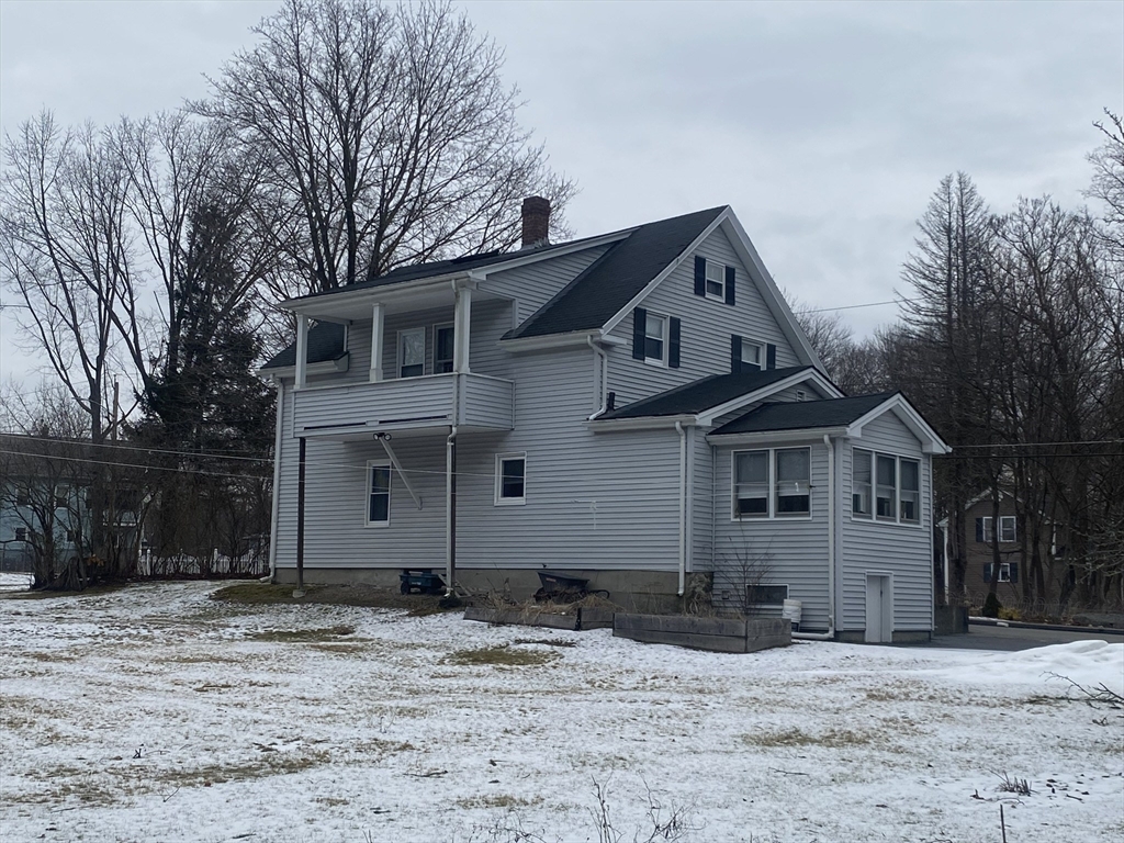 18 Eastern Avenue Webster, MA 01570 - Photo 5 of 36 a front view of a house with a yard