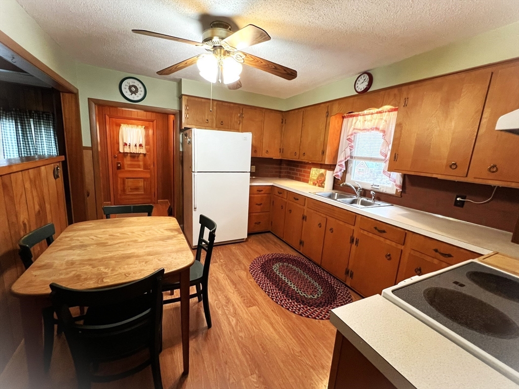 18 Eastern Avenue Webster, MA 01570 - Photo 10 of 36 a kitchen that has a cabinets and a stove