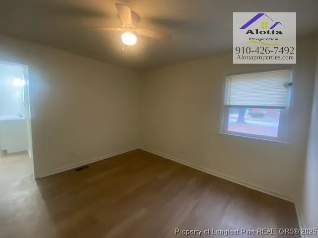 a view of a hallway with an empty room