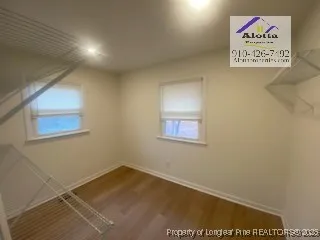 a view of a room that has a window in it