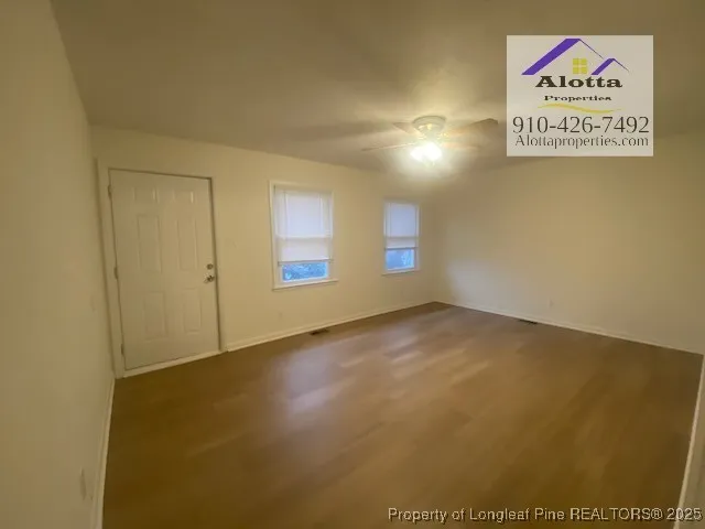 an empty room with windows