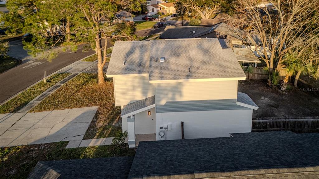 11033 Springridge Drive Tampa, FL 33624 - Photo 27 of 33 a view of a back yard of the house