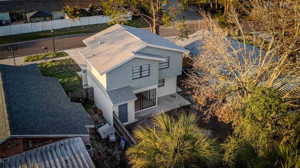 11033 Springridge Drive Tampa, FL 33624 - Photo 28 of 33 an aerial view of a house with a yard