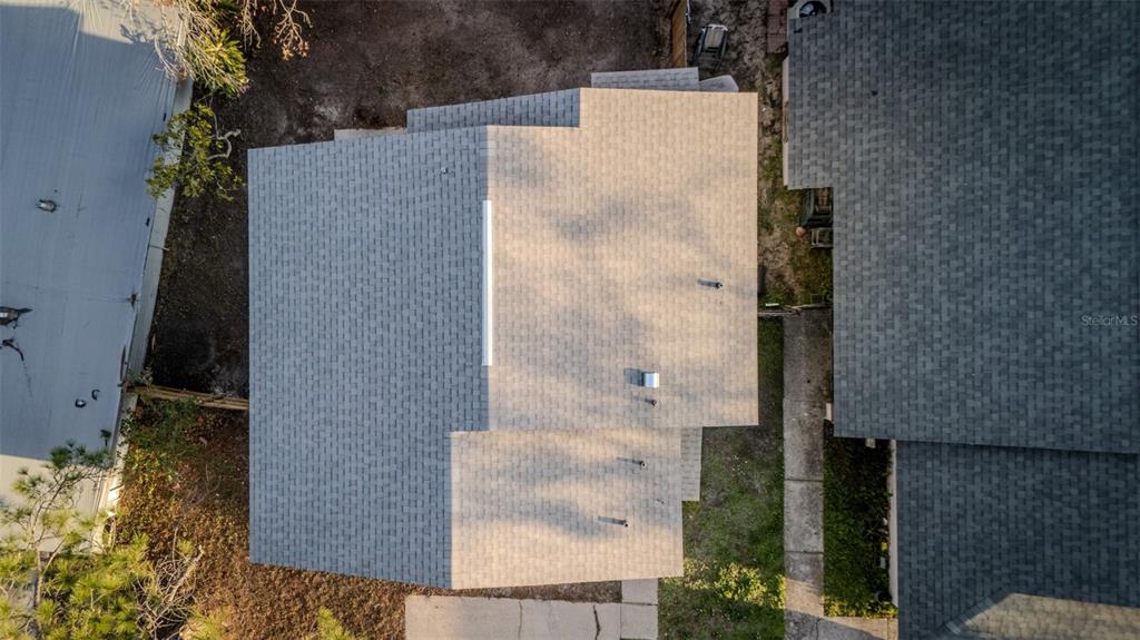 11033 Springridge Drive Tampa, FL 33624 - Photo 29 of 33 aerial view of a house with a yard