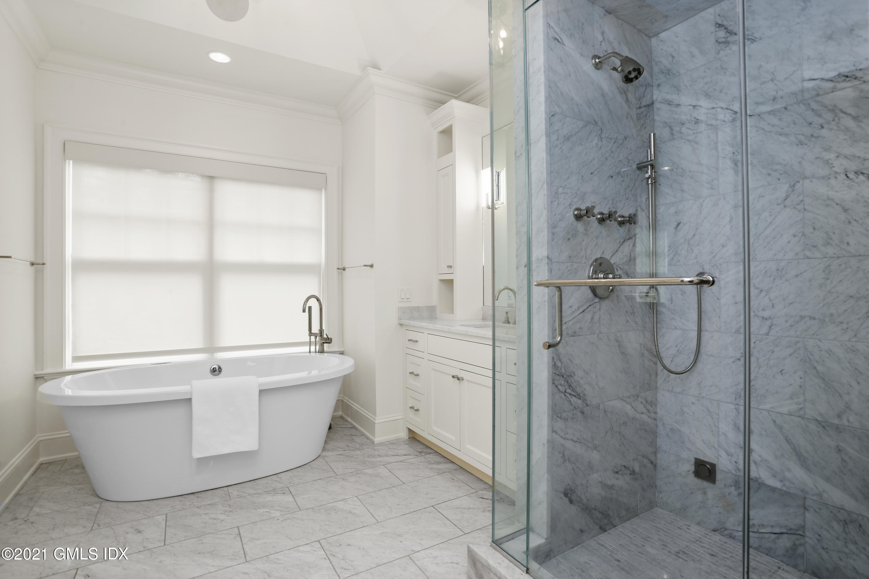 15 Terrace Avenue Riverside, CT 06878 - Photo 18 of 27 a bathroom with a bathtub and shower
