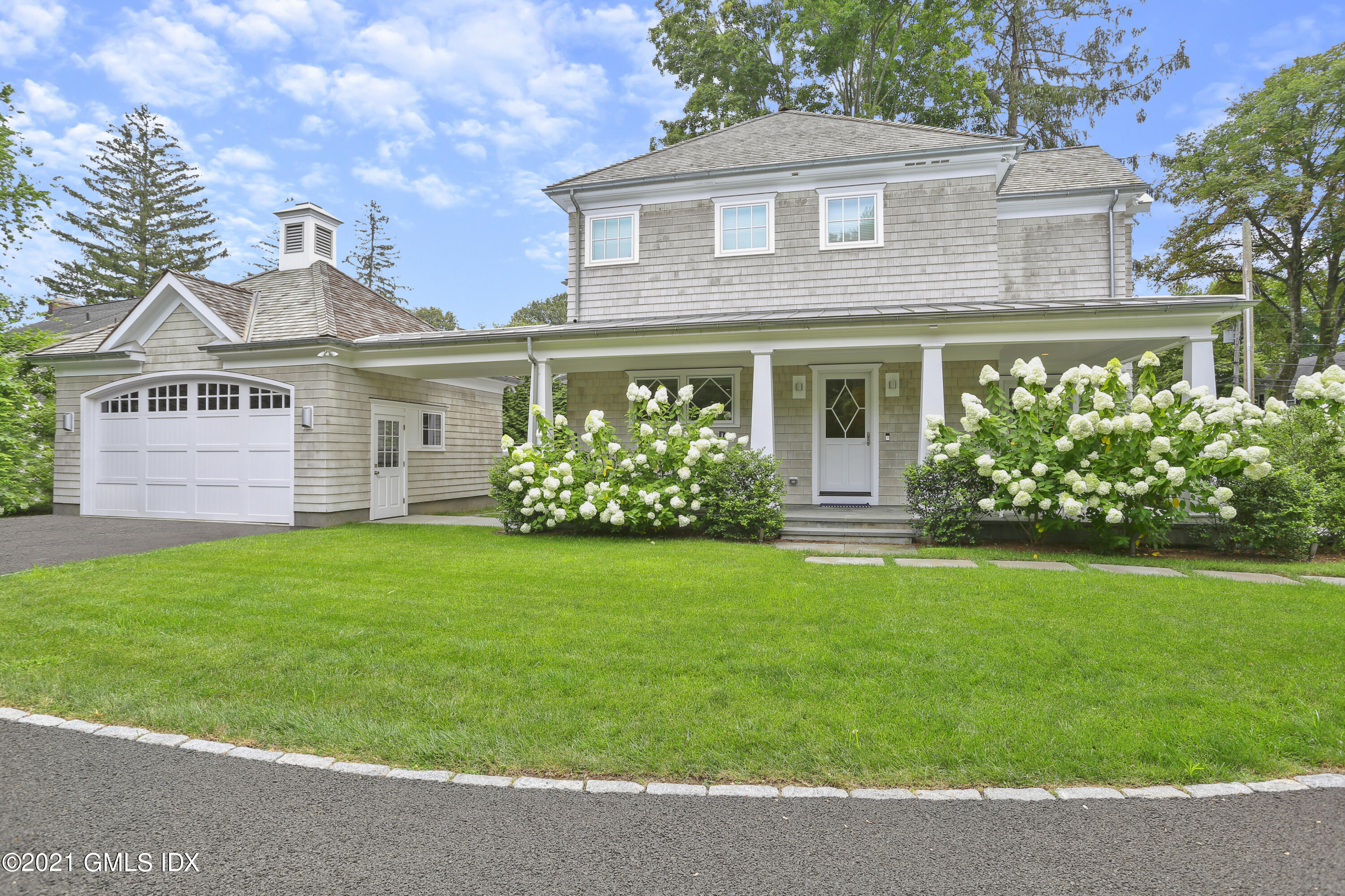 15 Terrace Avenue Riverside, CT 06878 - Photo 21 of 27 front view of a house with a yard