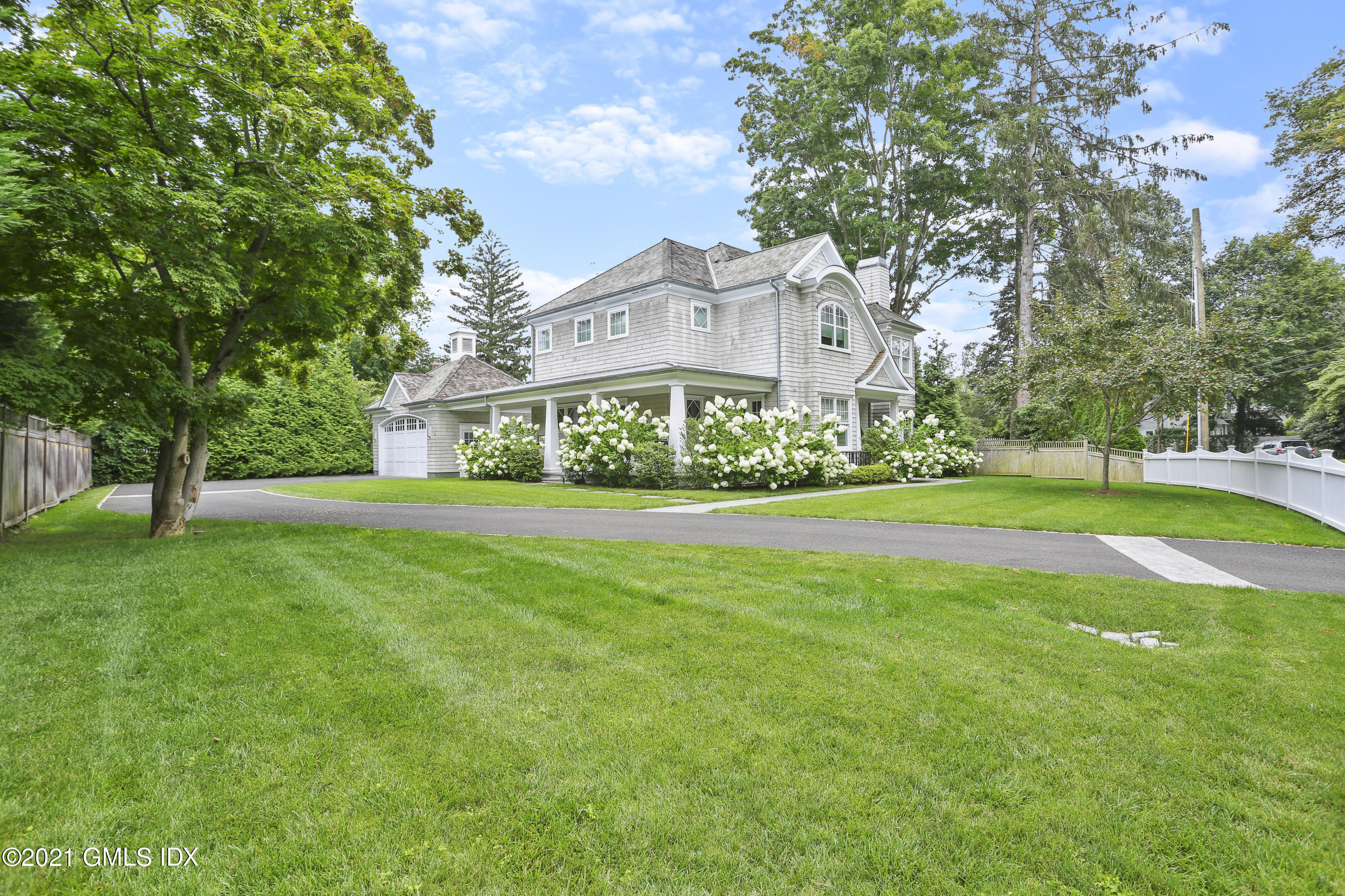 15 Terrace Avenue Riverside, CT 06878 - Photo 24 of 27 a front view of a house with garden