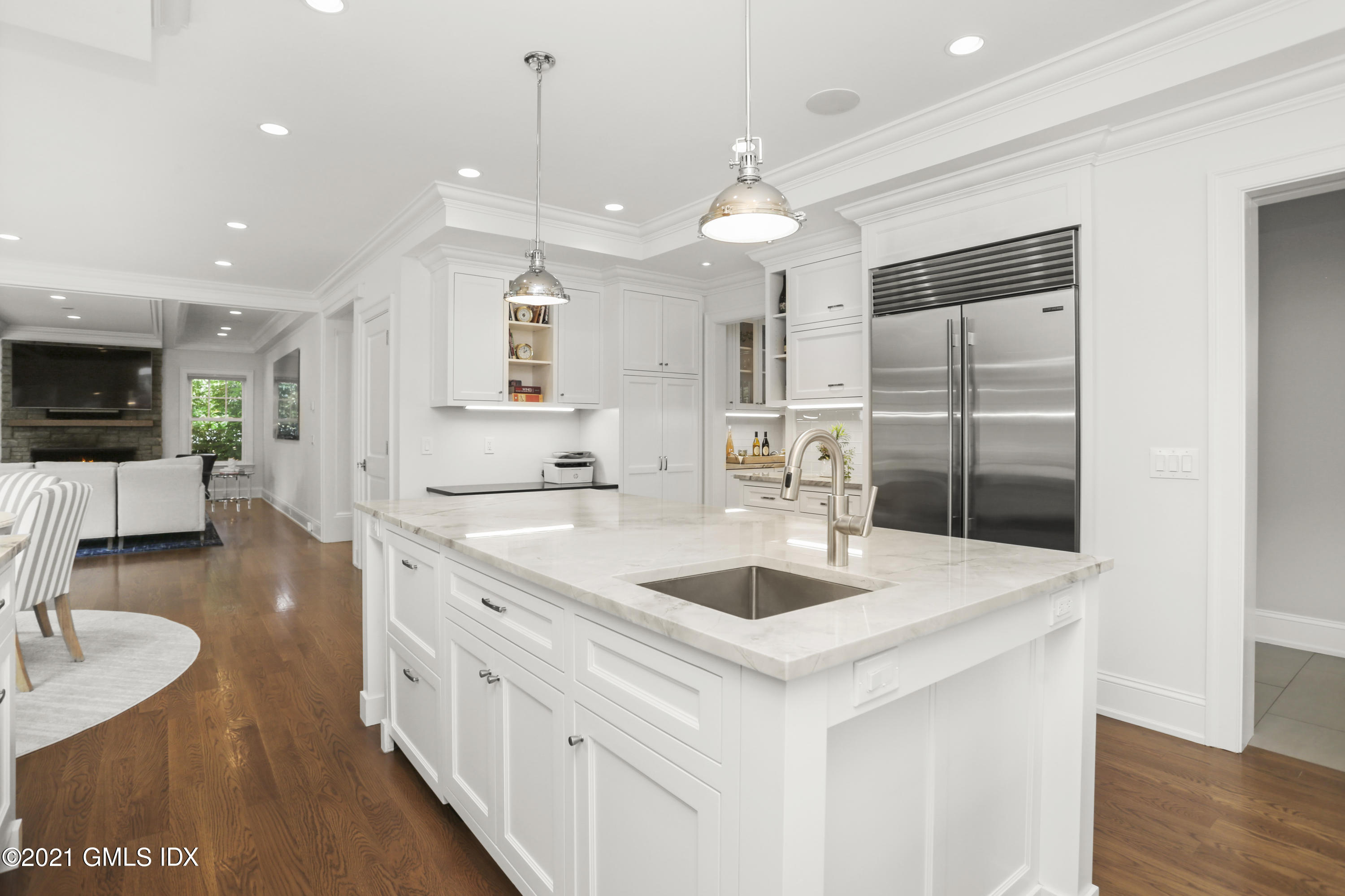 15 Terrace Avenue Riverside, CT 06878 - Photo 5 of 27 a large kitchen with kitchen island a sink stainless steel appliances and cabinets