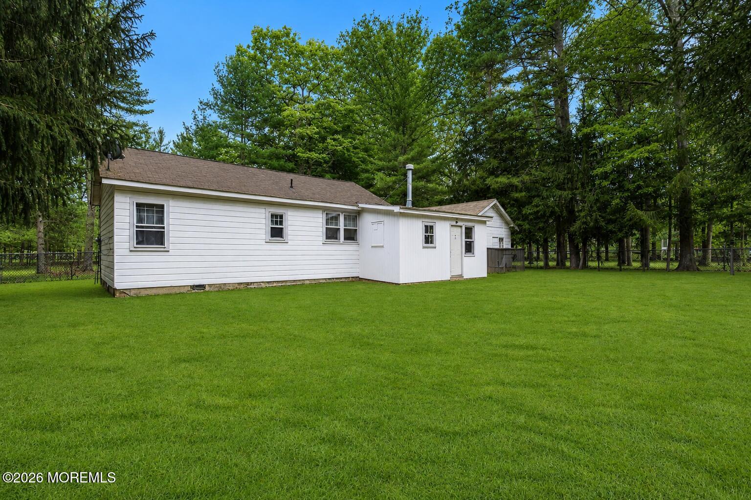 269 Alexander Avenue Howell, NJ 07731 - Photo 28 of 43 a front view of house with yard and green space